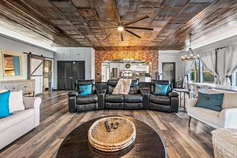 Large space with comfortable reclining sofas and additional seating for your group.