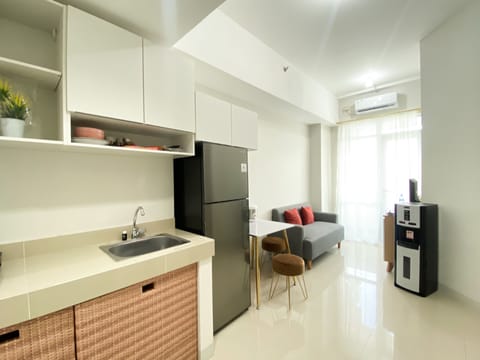 Apartment | Private kitchen | Fridge, stovetop, rice cooker, dining tables