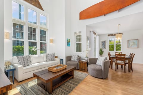 Airy living room flows effortlessly into the dining area.