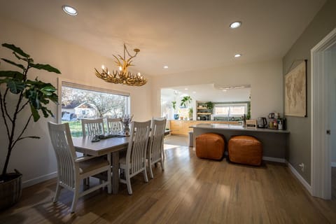 Dining table with leather pouf bar for maximum lounging and entertaining