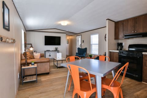 Open concept kitchen, dining and living area.