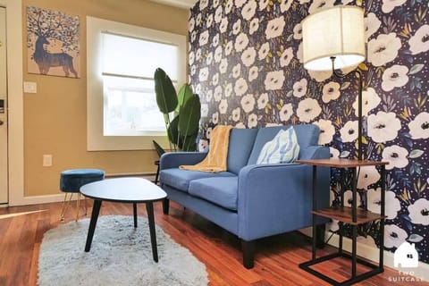 Settle into this bright living room — the perfect place to read a book, sip tea, or plan your next adventure in the city. 