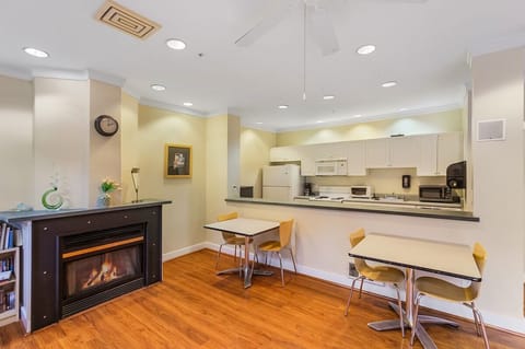 This is a shared space. The fireplace is decorative, not functional.