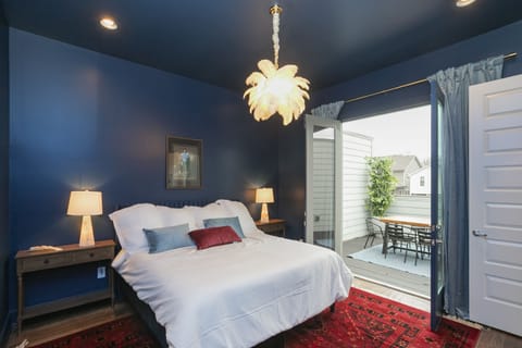After a good night's rest on the King bed in Master upstairs, step out to the rooftop deck to enjoy your morning coffee. (Master Bedroom; King Bed; Ensuite Bathroom; Floor 3)