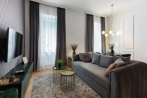 Deluxe Apartment | Living area | LCD TV