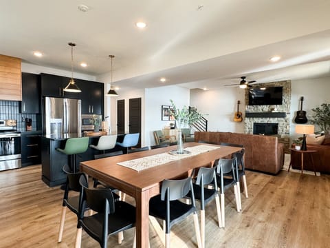 Overview of kitchen, dining room area, and living room