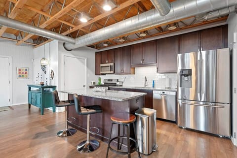 Fully Stocked Kitchen with Dining Bar