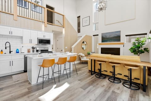 Sunlit space with modern flair, perfect for gatherings and culinary adventures!