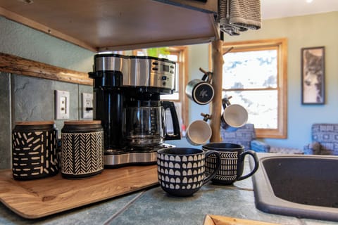 Coffee Machine, Tea Kettle, Ground coffee, sugar and a variety of teas provided!