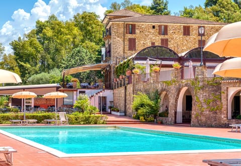 Seasonal outdoor pool, open 8:00 AM to 8:00 PM, pool umbrellas