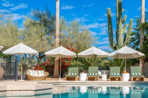 Embrace all the desert has to offer - poolside oasis w/ loungers, umbrellas + misters