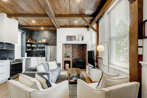 First floor with inglenook fireplace with propane fueled stove for comfy heat