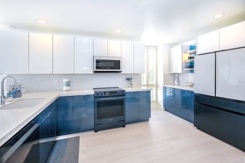 Whip up gourmet meals in the fully-equipped kitchen, boasting sleek countertops and state of the art appliances