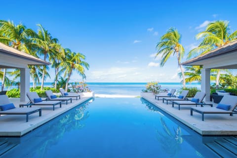 Wade into Sun Salutations private infinity pool with sweeping seaside views.