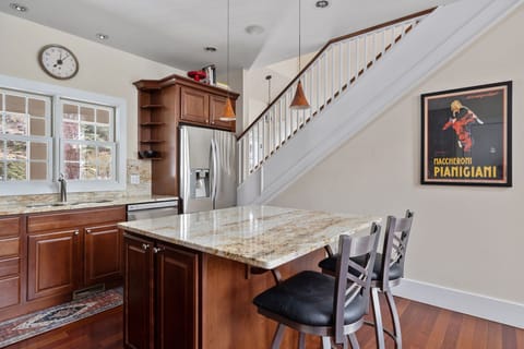 Want a snack or cup of morning coffee? Gather round the kitchen island, y'all!