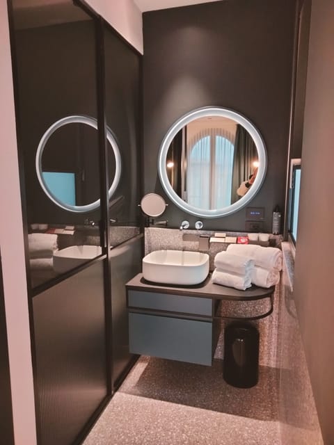 Eco-friendly toiletries, hair dryer, bathrobes, slippers