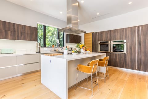 Kitchen features top-of-the-line appliances. 
