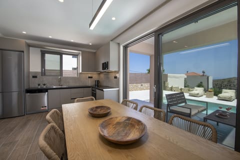 Villa | Private kitchen | Full-size fridge, microwave, oven, stovetop