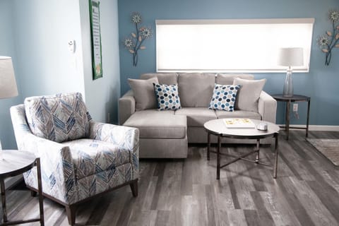 Living Room- Bright, inviting space to relax after a day of exploring