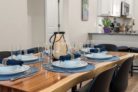 Kitchen is fully furnished with a table service for 12. For parties of 12, additional chairs are available for the table and 4 comfy benches at the bar