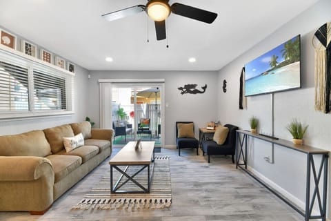 Bright and cozy living room with a queen-size sofa bed | Smart TV
