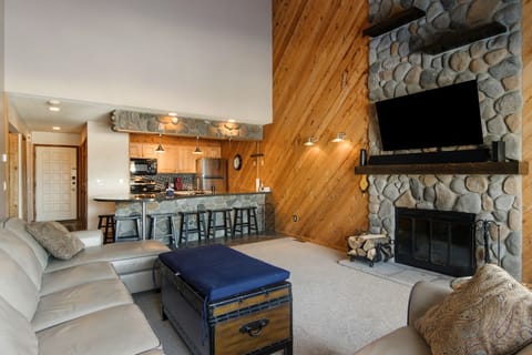 Spacious Living Room with Wood Fireplace.