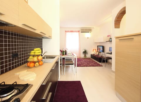 Apartment, 2 Bedrooms (Glicine) | Private kitchen | Fridge, microwave, oven, stovetop