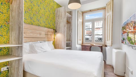 A spacious bedroom overflowing with sun light ready to accommodate two guests. #comfort #naturallight #portugal #pt #lisbon
