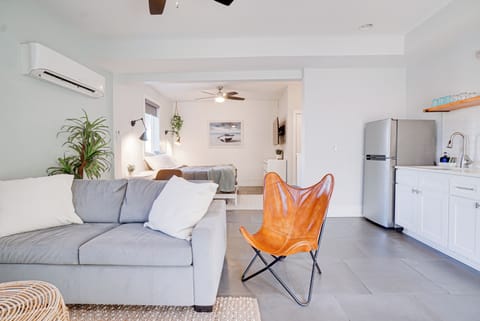 Downstairs condo with living space, kitchenette and king bed 