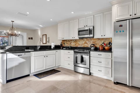 Open kitchen & dining area with all the necessities for meal making!