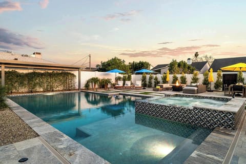 Pool Courtyard pool and spa view of lounge area, fire pit and outdoor dining.