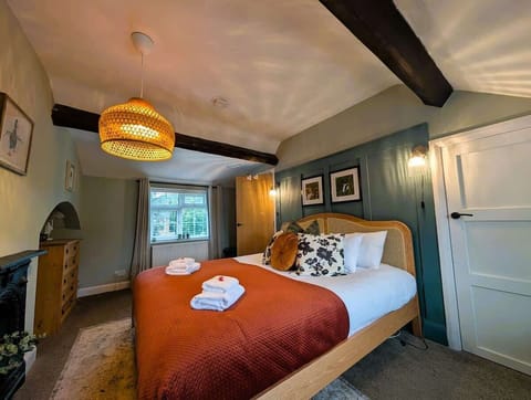 Master Bedroom: discover serenity in our spacious and elegant super king-sized bedroom, featuring a neutral colour scheme, natural materials, wardrobe 