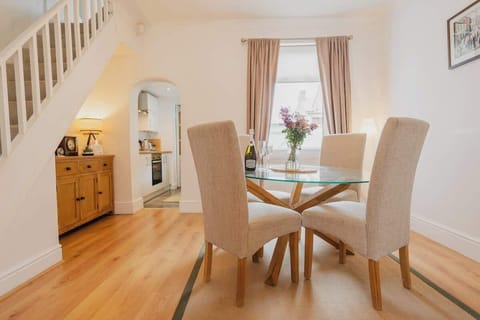 The Living/Dining Room: host a memorable dining experience with the dining area linking to the kitchen for a sociable evening.