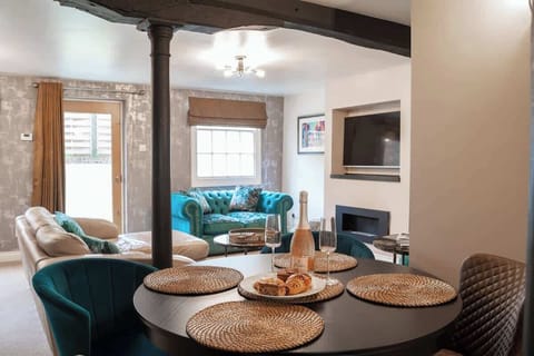 The Open Plan Living Space: relax on our comfortable sofas and indulge in a film after a meal to remember.