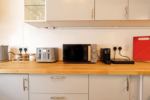 The Kitchen: a home away from home with all amenities you need for a comfortable stay.