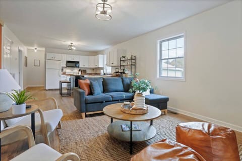 Living Room: Bright and airy space with stylish furniture and mountain views—perfect for gathering!