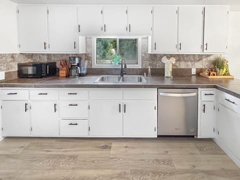 Spacious kitchen for meal prep, enjoying friends and family