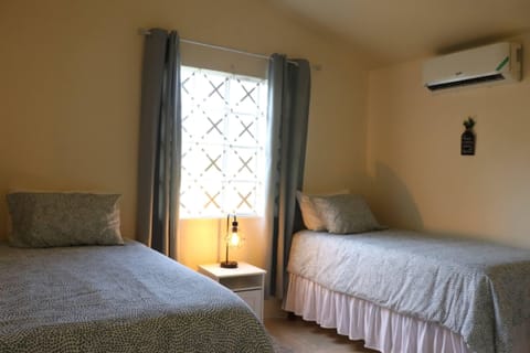 Two twin beds - air conditioned bedroom
