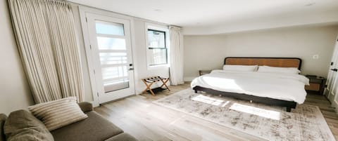 Bedroom, View of King Size Bed and Porch Door (1)