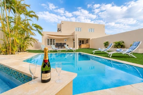Enjoy a refreshing swim in your private pool, then unwind on the sun loungers or enjoy a drink by the water.