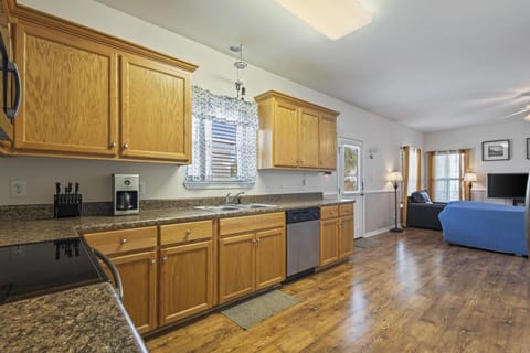 Kitchen - The kitchen is open to the large living area to ensure no quality time is missed spending with each other. A full size washer and dryer is provided for convenience.
