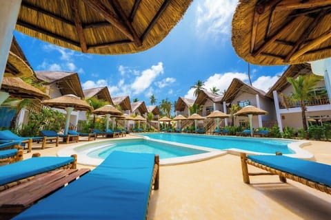 Outdoor pool, pool umbrellas, sun loungers