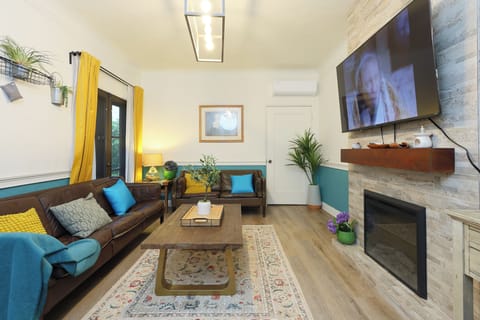 Bask in natural light in this airy living room.