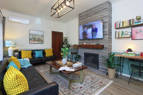 Unwind in the comfy living area with a smart TV and plenty of space to lounge.