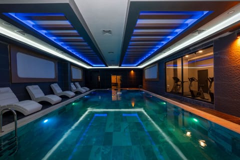 Indoor pool, open 10:00 AM to 10:00 PM, sun loungers