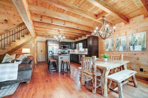 Dining table seats 8 with 4 additional bar stools at the island