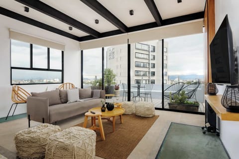 Bright living room with city views.