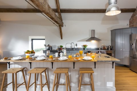 The sit-up island in the kitchen offers the perfect spot for enjoying breakfast