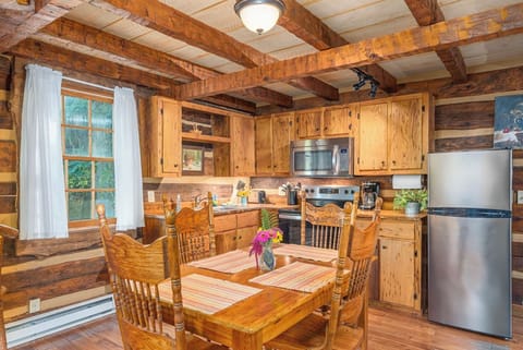 The kitchen is small, but it is equipped with the things you need to make a meal in house.