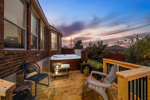 Wind down the day on the Deck featuring a 6 person hot tub, grill, and seating.